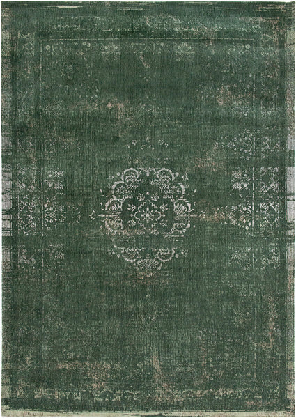 A Truly Vintage look Medallion Large flatweave rug in Green from The Fading World collection by Louis De Poortere