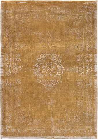 A Truly Vintage look Medallion Large flatweave rug in Ochre from The Fading World collection by Louis De Poortere