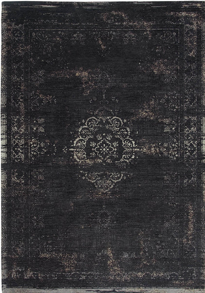 A Truly Vintage look Medallion flatweave rug in Black from the Fading World collection by Louis De Poortere