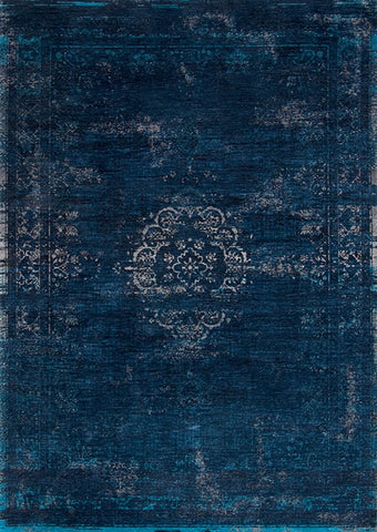 A Truly Vintage look Medallion flatweave rug in Deep Blue from the Fading World collection by Louis De Poortere
