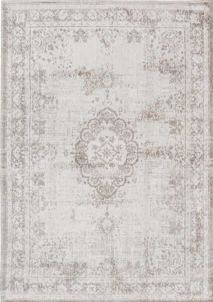 A Truly Vintage look Medallion flatweave rug in Ivory from The Fading World collection by Louis De Poortere
