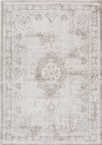 A Truly Vintage look Medallion flatweave rug in Ivory from The Fading World collection by Louis De Poortere