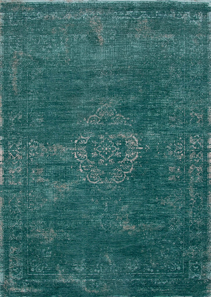 A Truly Vintage look Medallion Large flatweave rug in Jade from The Fading World collection by Louis De Poortere