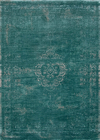 A Truly Vintage look Medallion Large flatweave rug in Jade from The Fading World collection by Louis De Poortere
